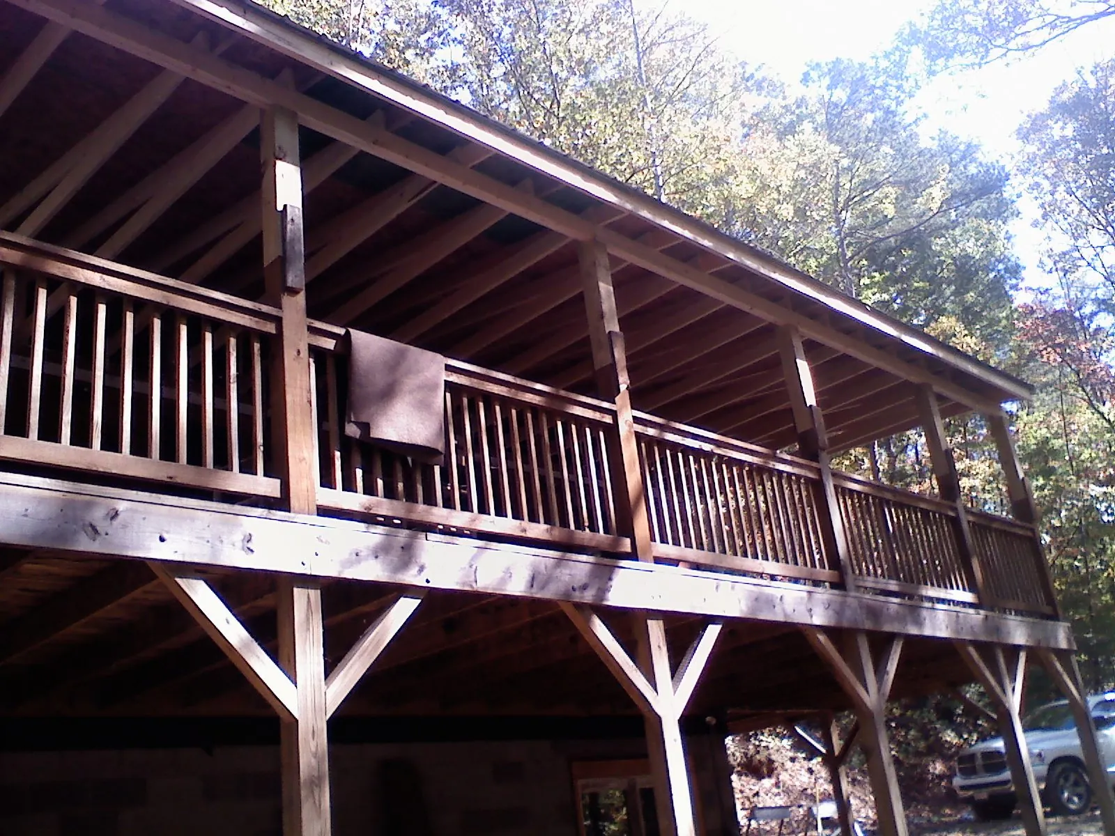 Timber framing under a new elevated porch and deck — Roof Leak Repair in Egan by Roofing Brothers